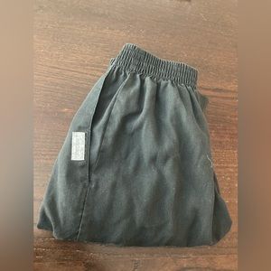 I am selling a pair of black joggers with a rim edge at the bottom. List: $15.00